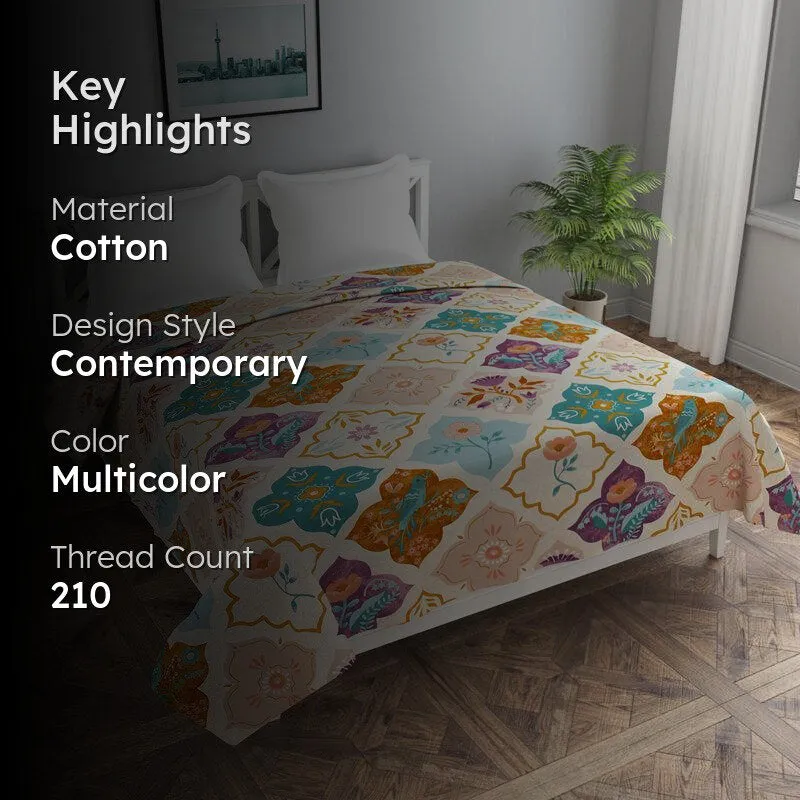 Multicolour patterned duvet cover styled on a bedroom bed