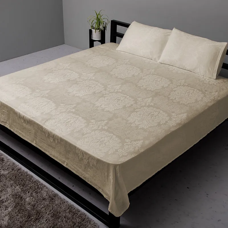 Beige floral jacquard bedsheet and pillow covers styled on a king bed