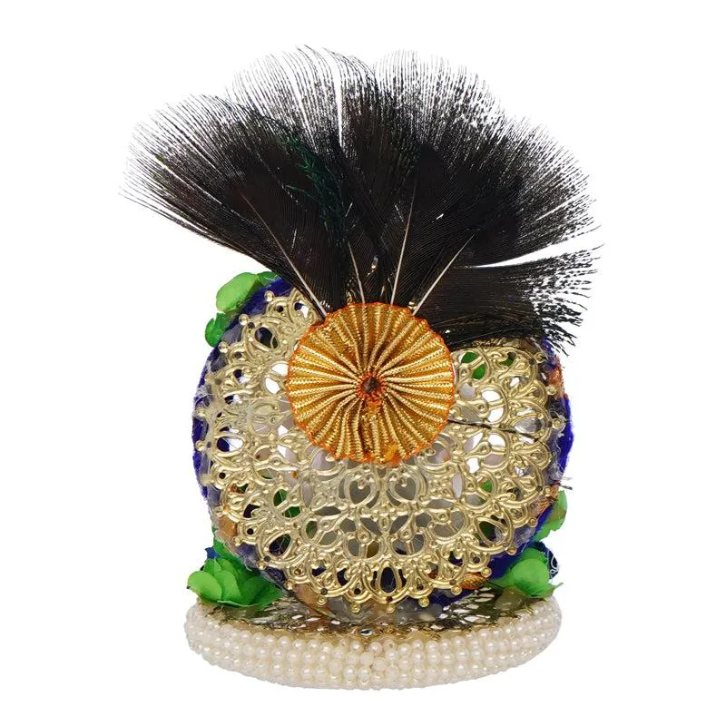 Back view of a Ganesha idol showing ornate gold detailing and peacock feathers