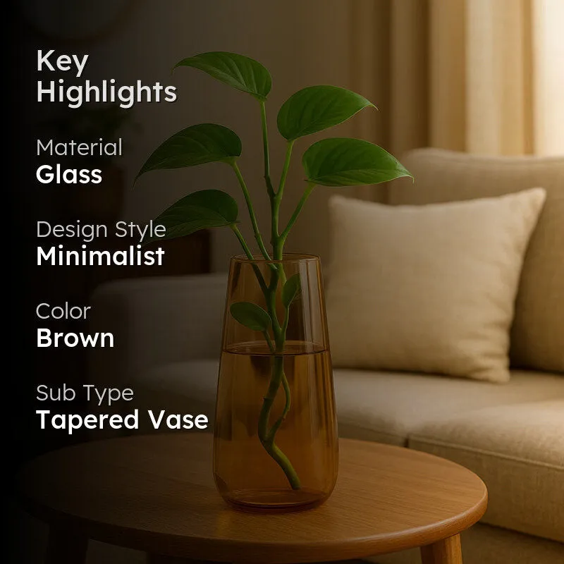 Brown glass vase with green stems on a wooden table with a dark text overlay panel