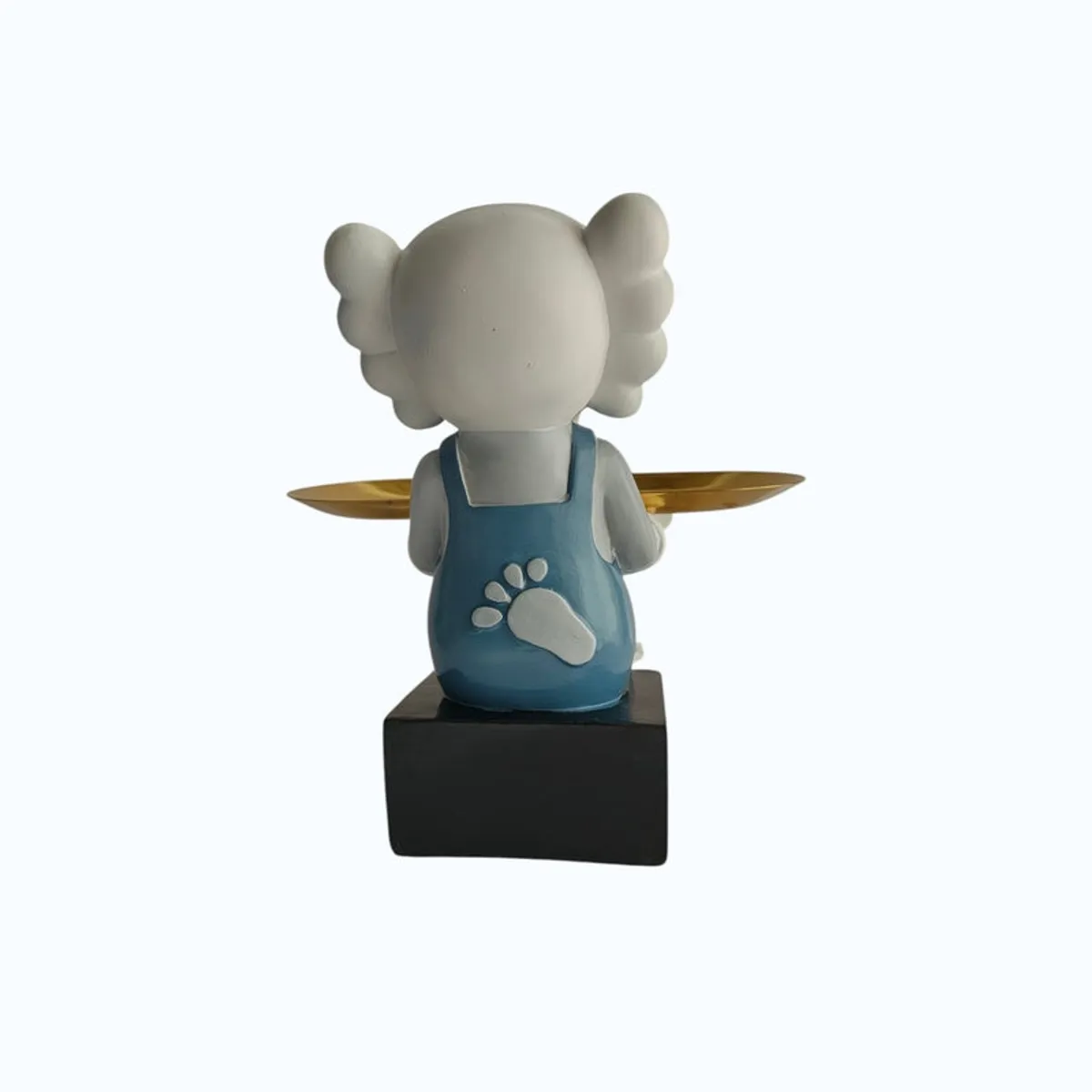 Back view showing the figurine's blue outfit, black base and gold tray