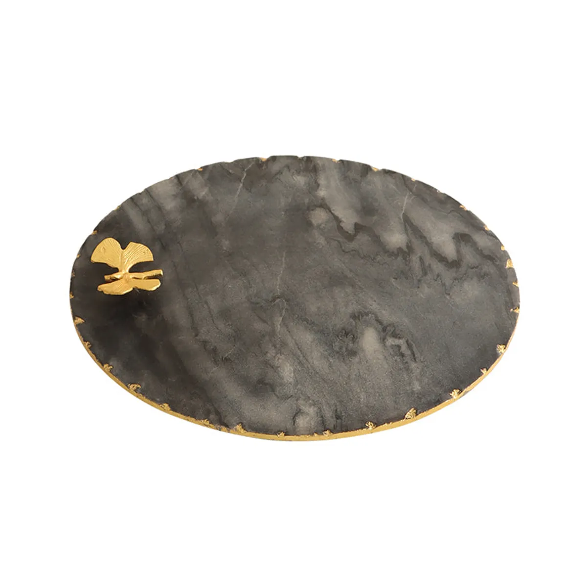 Black round marble platter with gold edging and butterfly detail on a white background