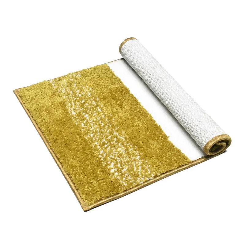 Rolled yellow rectangular bath mat showing the underside
