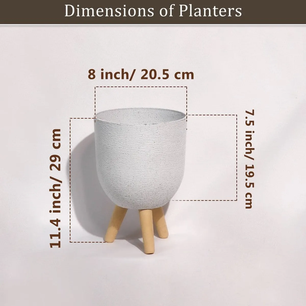White planter with wooden legs shown with visible height and width markings.