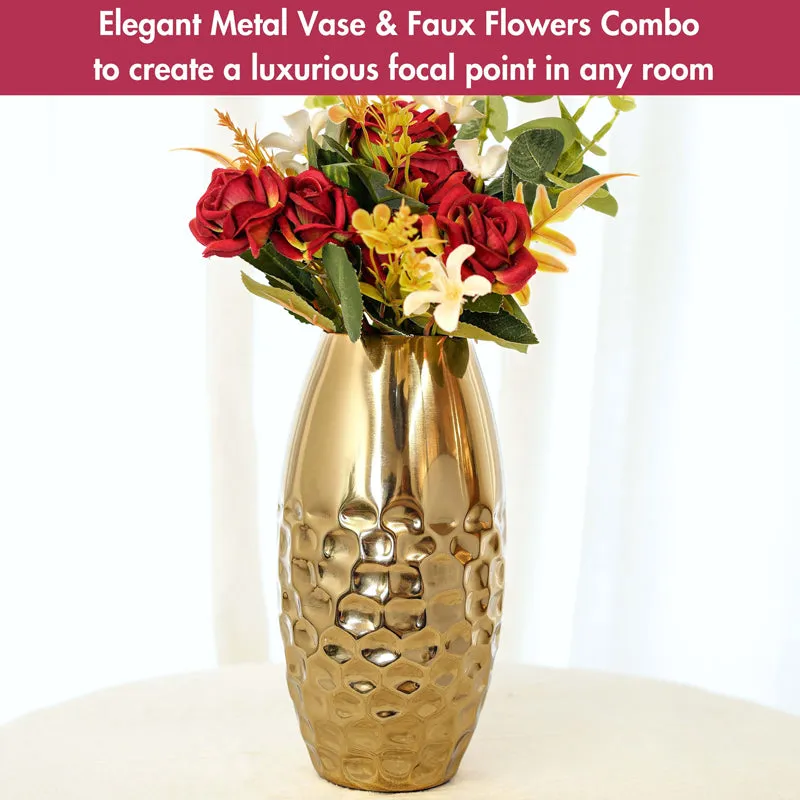 Artificial rose arrangement displayed in a gold textured vase