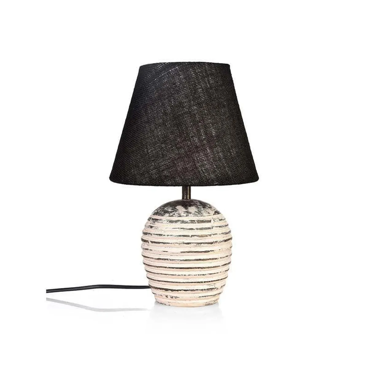 Table lamp with black conical shade and ribbed beige base on white background