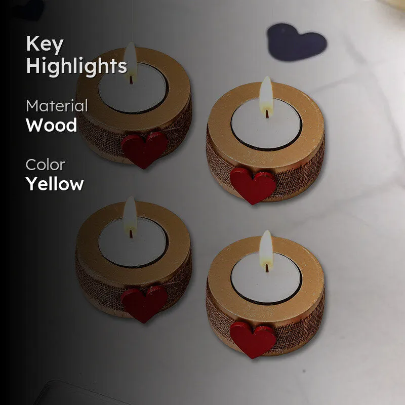 Four heart-accented tea light holders arranged together