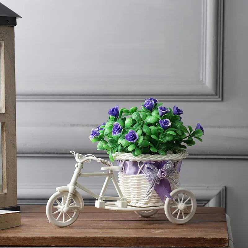 Faux Violet Flower Plant On Mini Cycle Rikshaw media 1