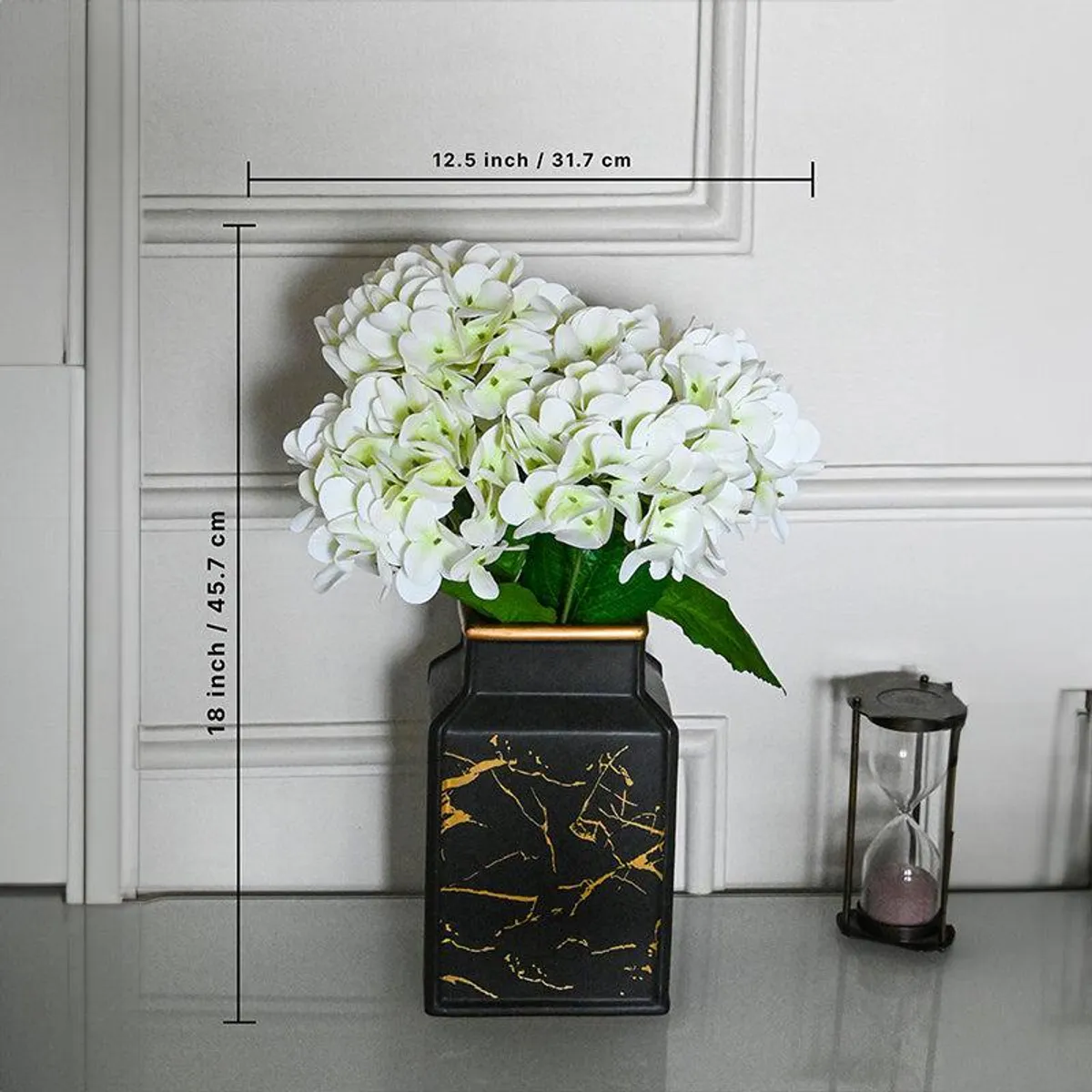 White hydrangea artificial flower stick displayed in a black decorative vase