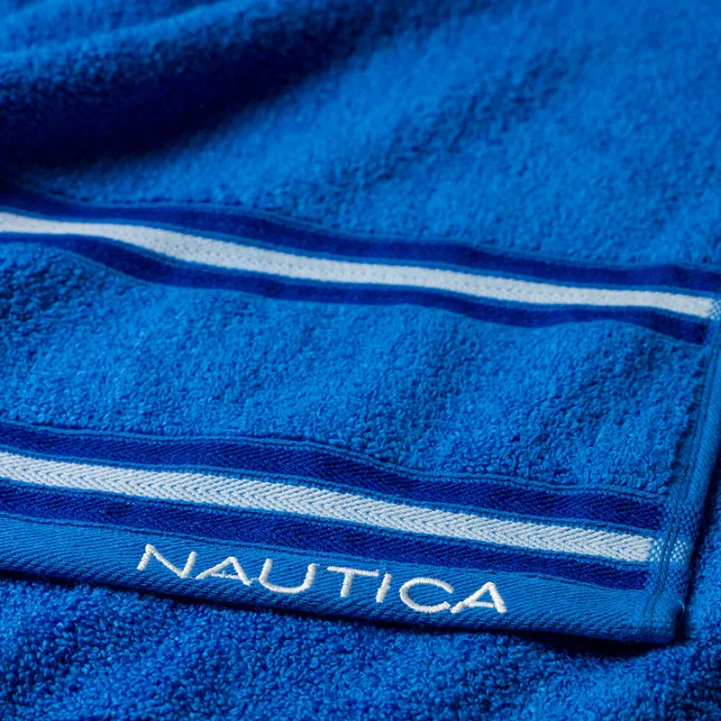 Blue striped plush face towel with a soft textured surface and Nautica branding