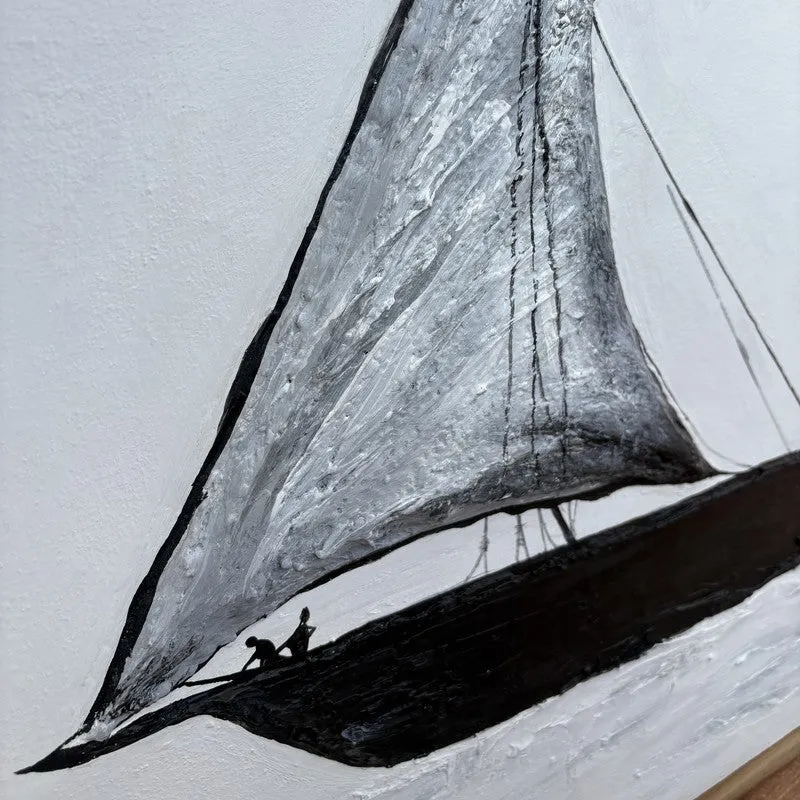 Close-up of the sail and front of the painted ship showing texture