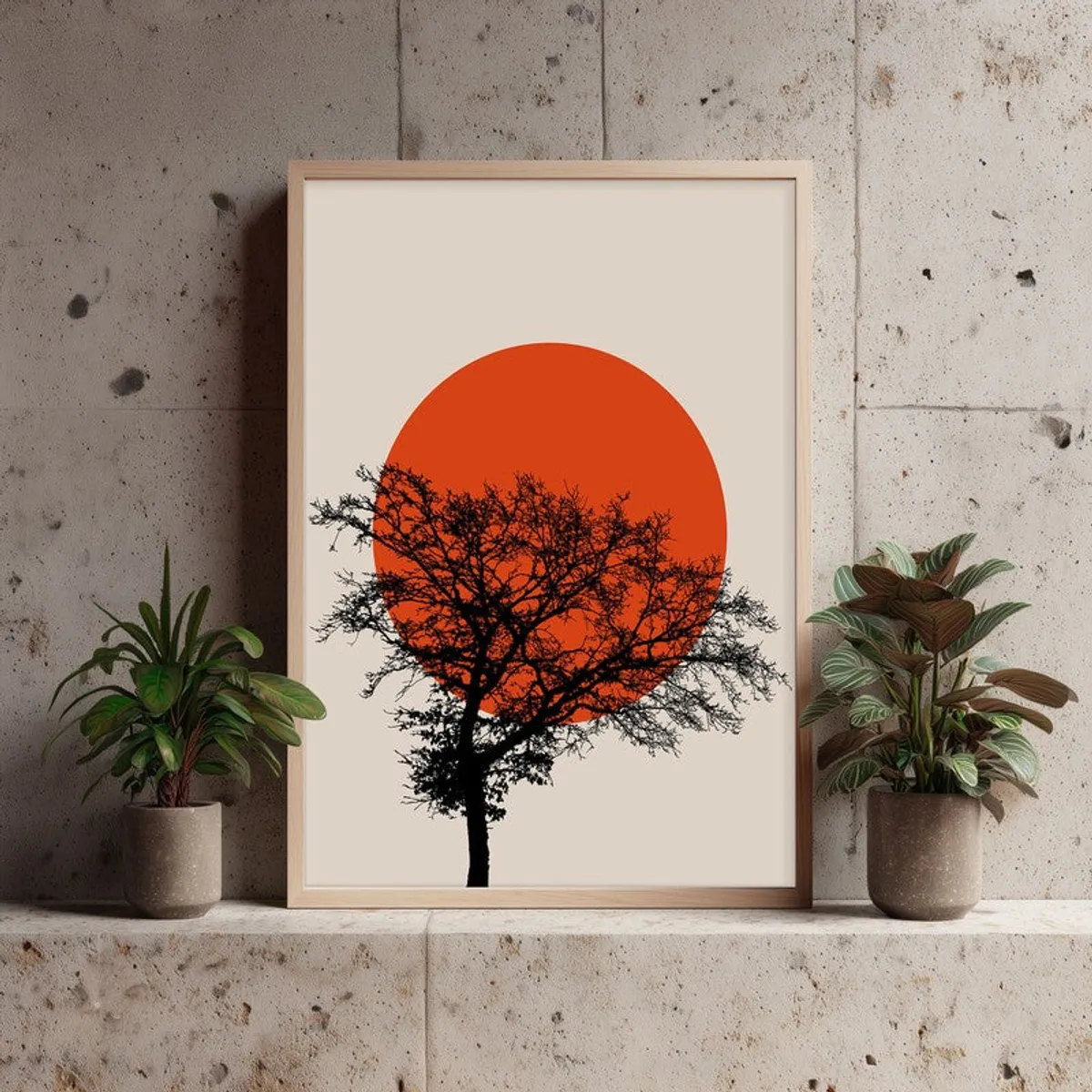 Tree silhouette wall art with an orange sun in a light brown frame