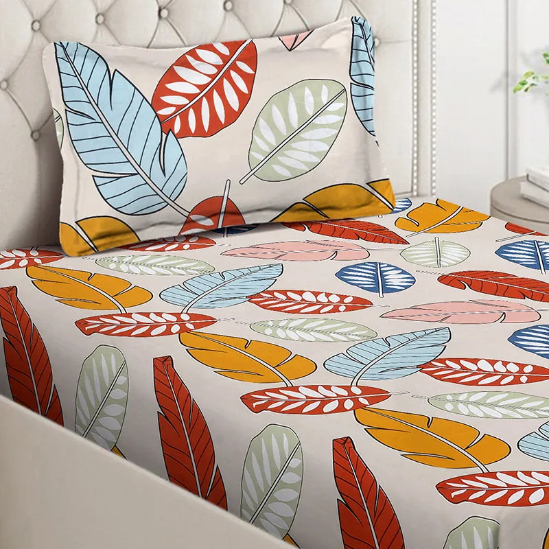 Close-up of multicolour leaf print bedsheet and pillow cover