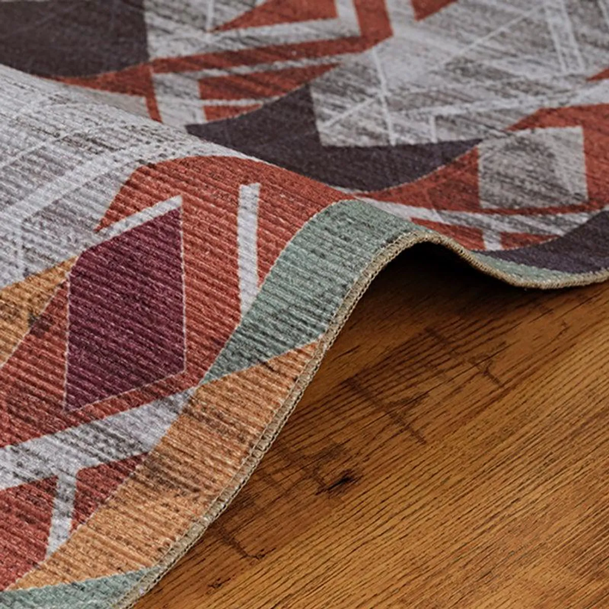 Close-up of the carpet edge showing flat woven surface and pattern detail