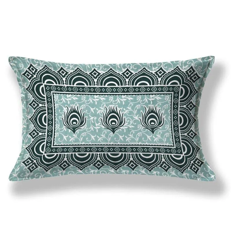 Matching green pillow cover with black ethnic border and feather motifs