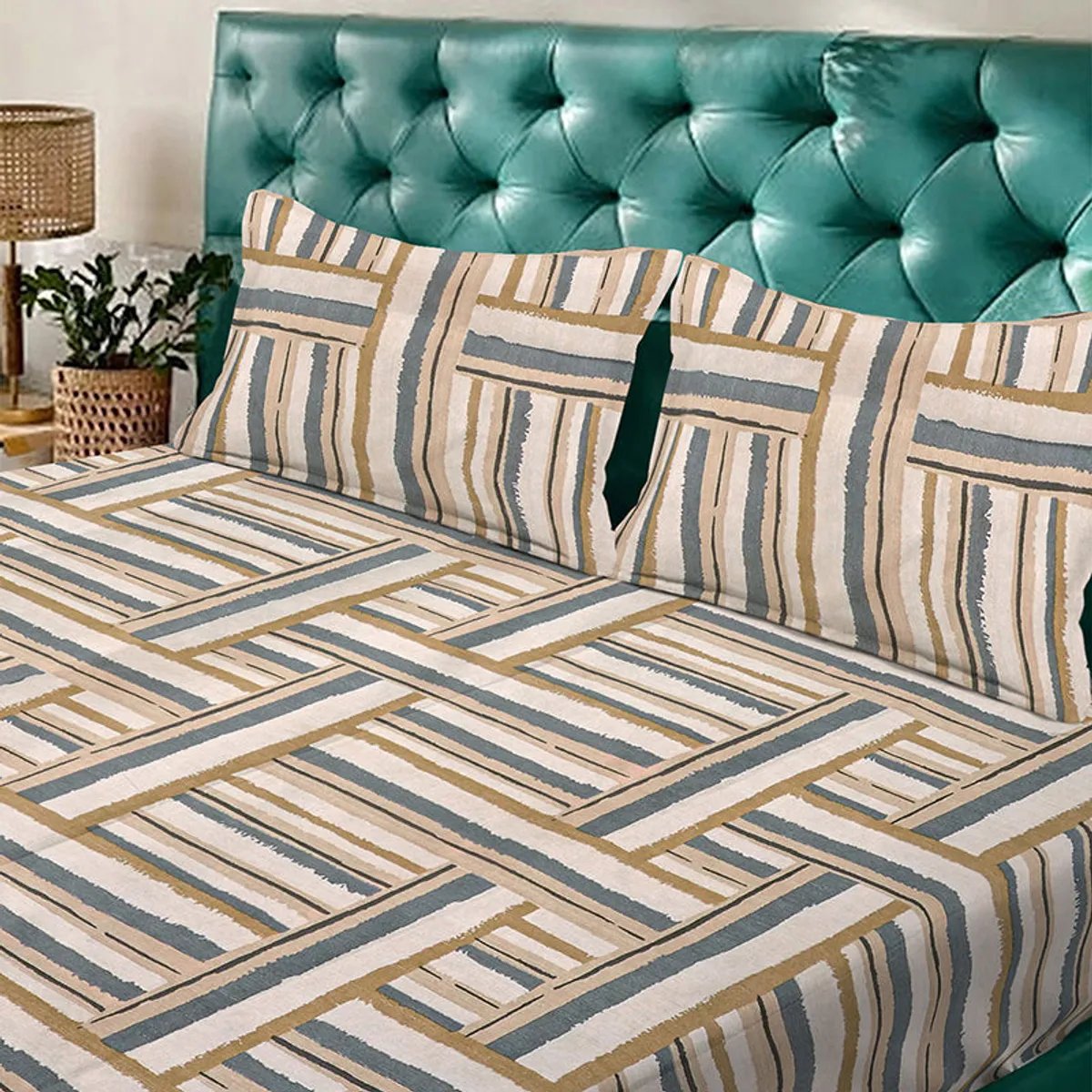 Close view of geometric striped bedding in beige, grey and cream