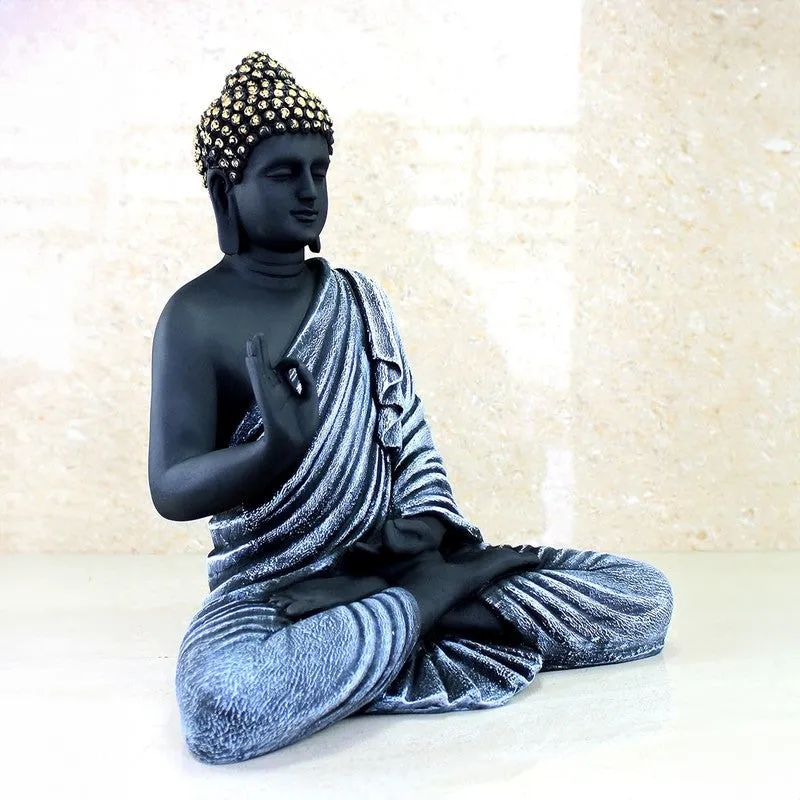 Angled left view of black Buddha idol in meditation pose