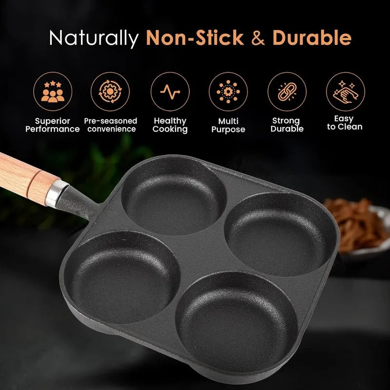 Square four-pit cast iron pan with a matte black finish and wood-look handle