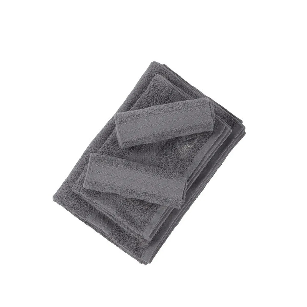 Dark grey bath and hand towels folded together on a white background