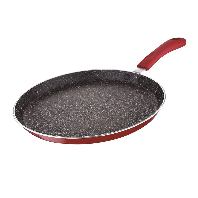 Red non-stick dosa tawa with speckled black cooking surface and curved handle