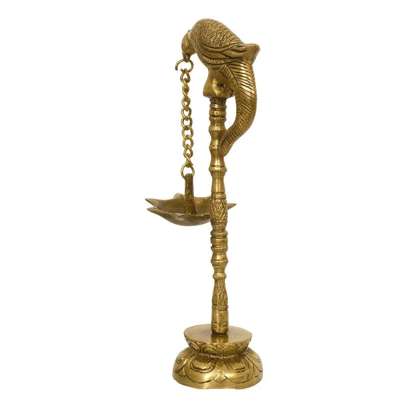 Rear three-quarter view of the gold brass parrot diya and hanging chain.
