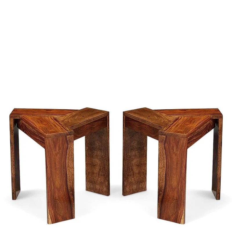 Two matching brown Sheesham wood side tables shown side by side