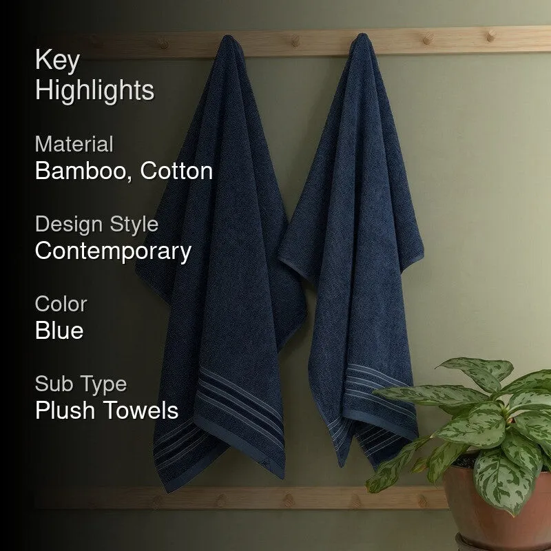 Blue bath towels hanging on a rack with key highlights text