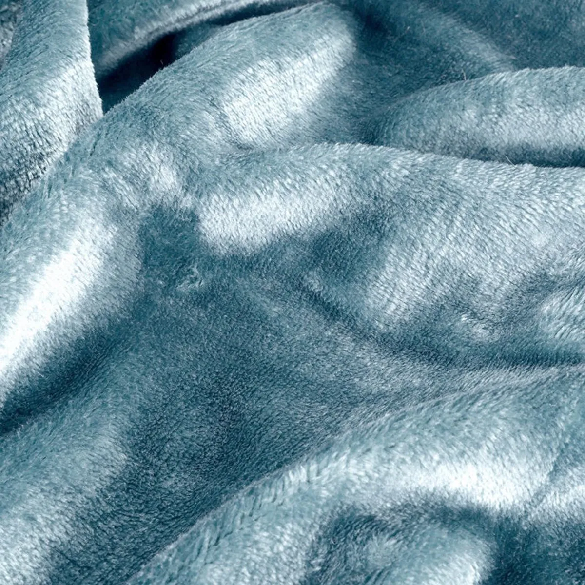 Close-up of the plush sky blue velvet surface and sheen