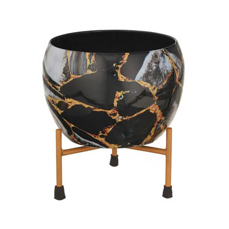 Single black marbled planter with gold veining displayed on its stand