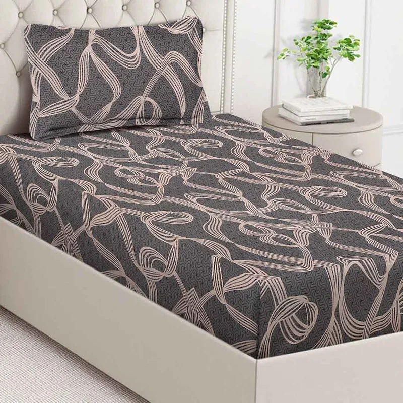 Close view of grey bedsheet with peach abstract line pattern