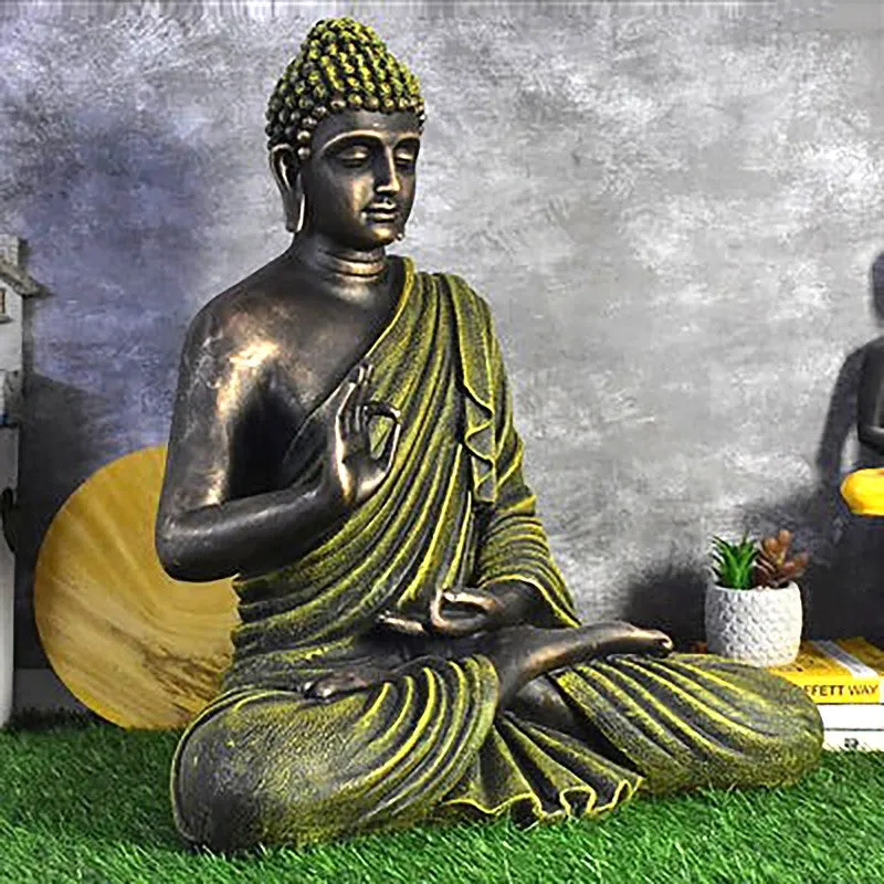 Three-quarter view of a meditating Buddha marble idol