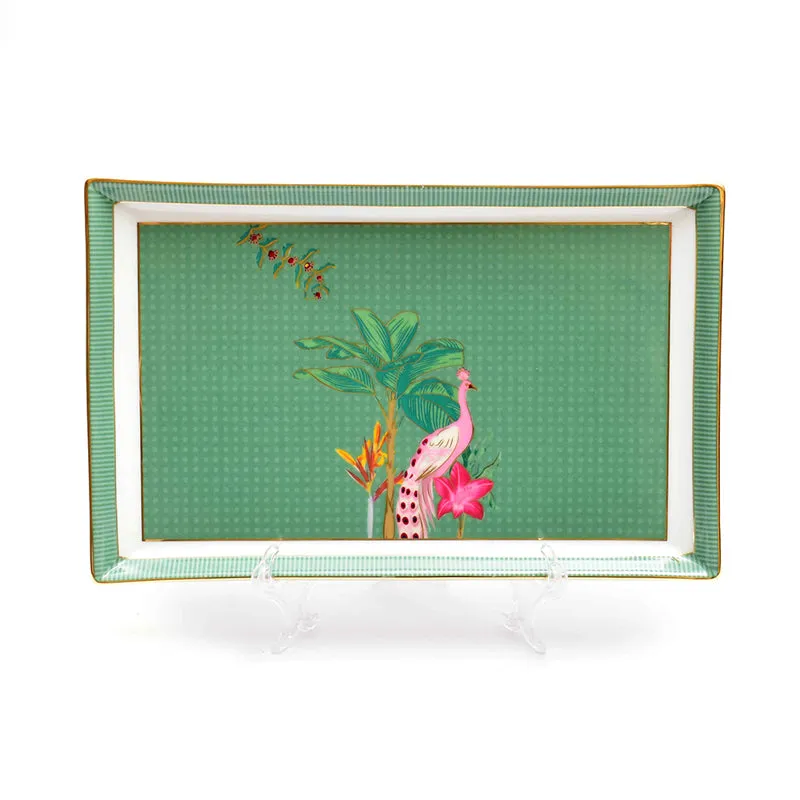 Rectangular green porcelain platter with a pink peacock, tropical foliage and gold accents