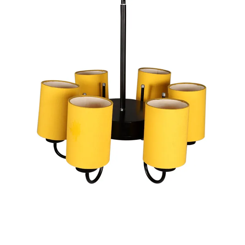 Close view of the yellow cylindrical shades and black metal frame