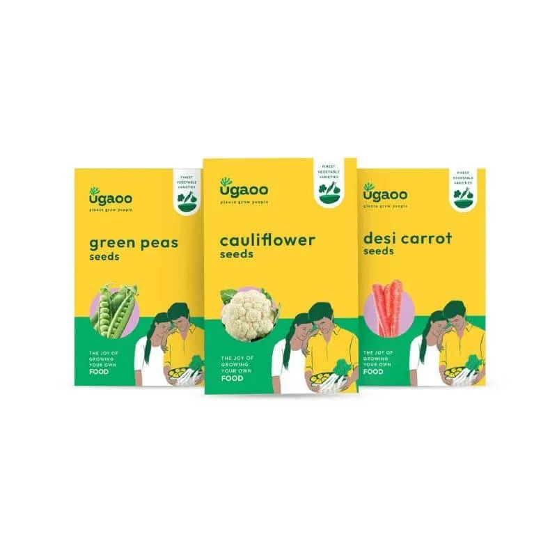 Front view of three Ugaoo seed packs for green peas, cauliflower and desi carrot