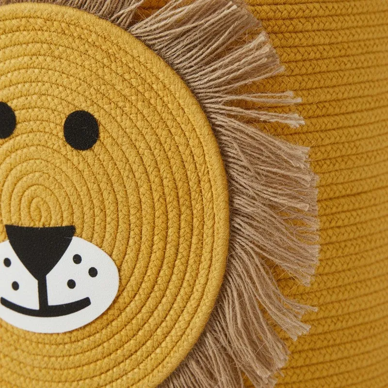 Close-up of the lion face applique and textured woven surface on the basket