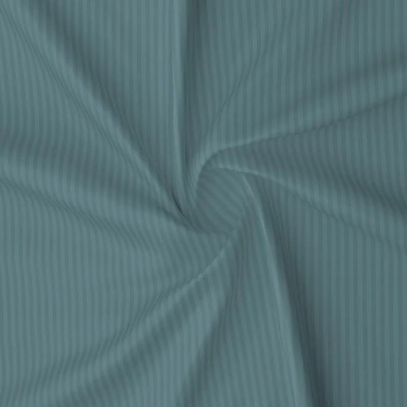 Close-up of teal striped glace cotton fabric texture