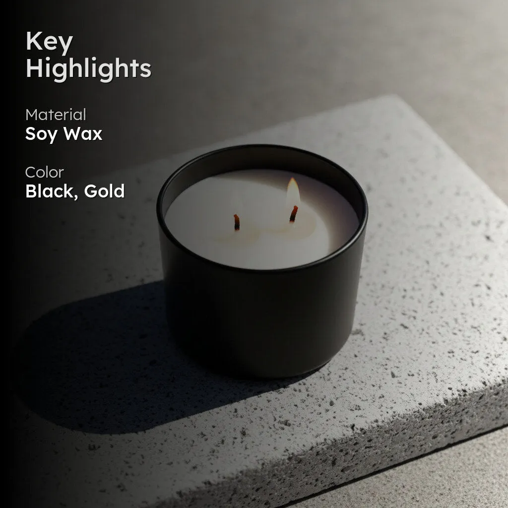 Black candle with two lit wicks on a stone surface