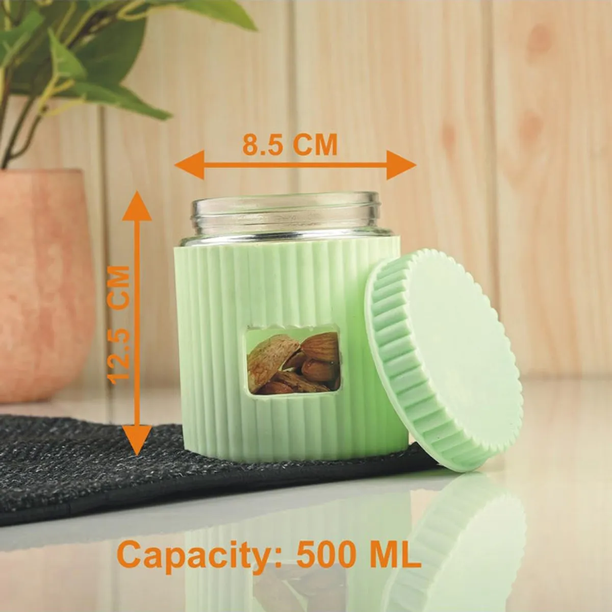 Mint-green storage jar shown with its 500 mL capacity and dimensions