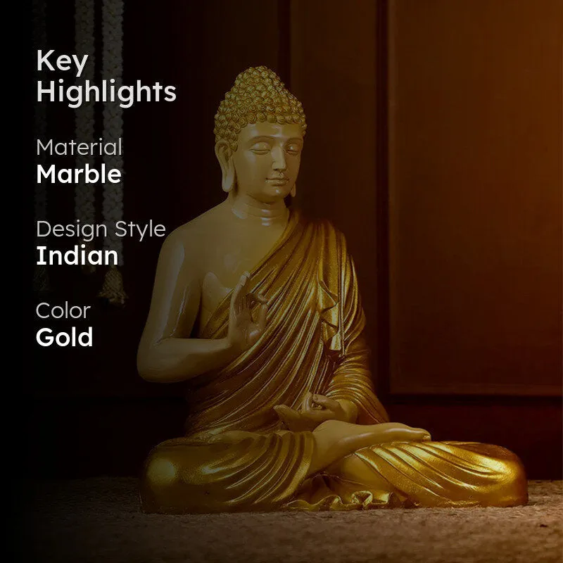 Gold meditating Buddha idol displayed against a dark decorative backdrop.