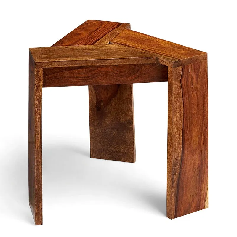 Brown Sheesham wood side table with a geometric top and three-panel base