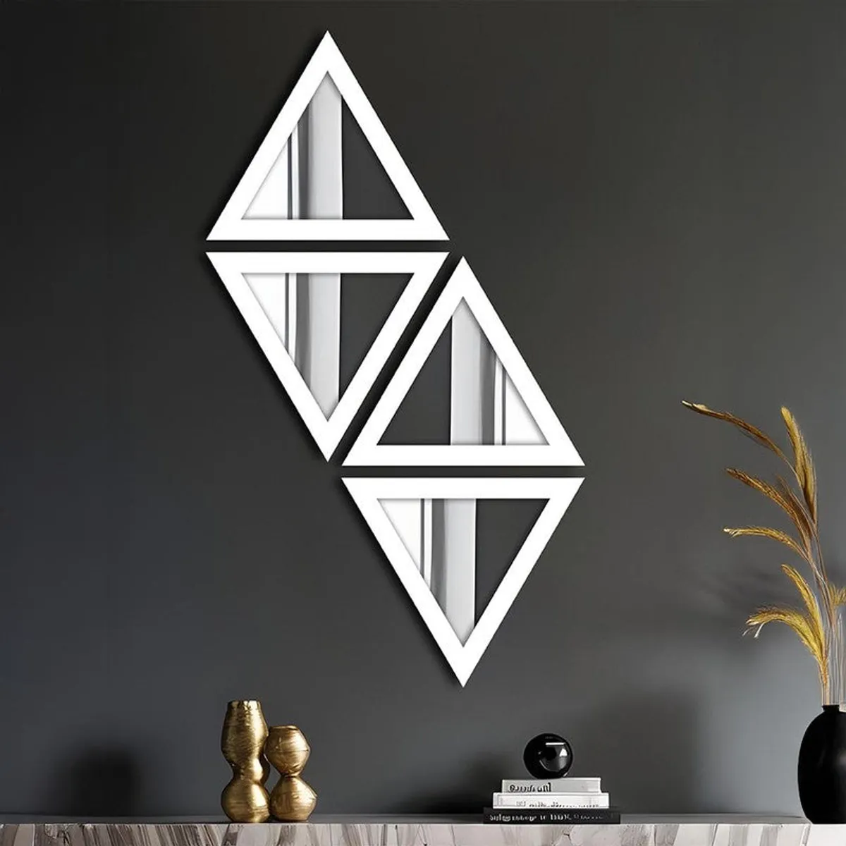 White triangular wall mirror set displayed on a dark grey wall