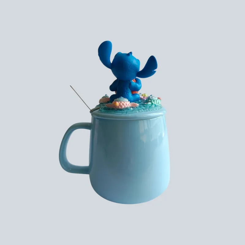 Back view of a light blue mug with a decorative Stitch figurine lid