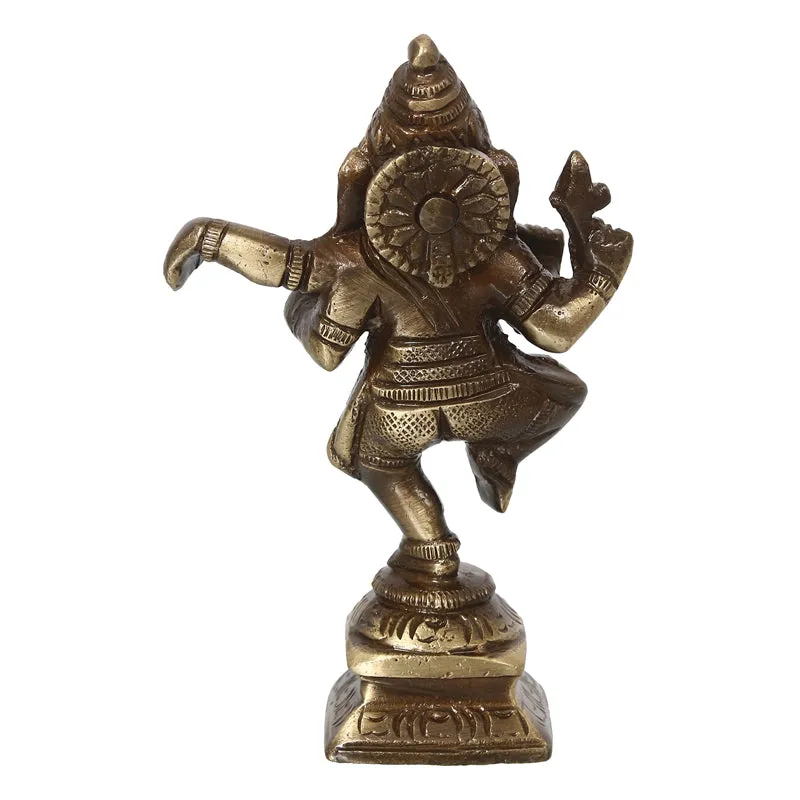 Rear view of brass Ganesha dancing showpiece
