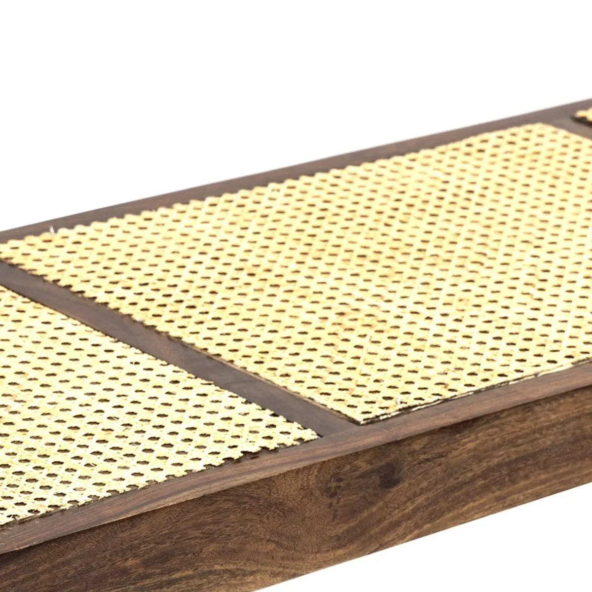 Close-up of beige woven cane seat set in wooden frame