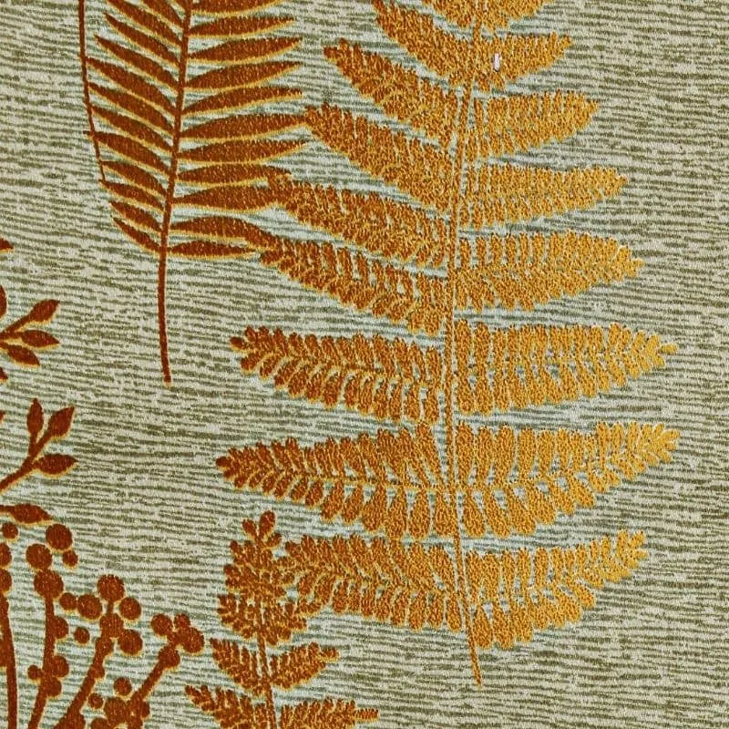 Close-up of green curtain with gold leaf and floral botanical motif