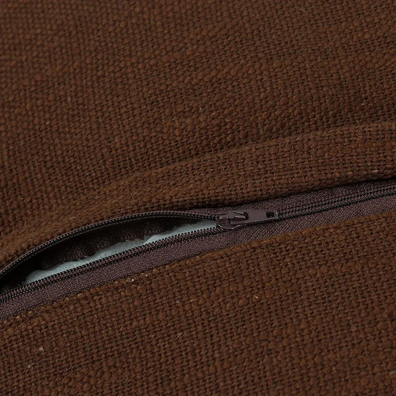 Close-up of brown cushion cover fabric with concealed zip opening