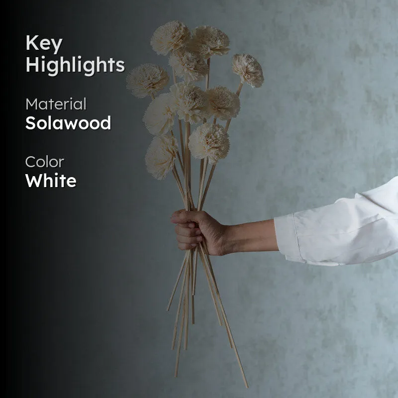 White sola flower sticks bouquet against a blue background