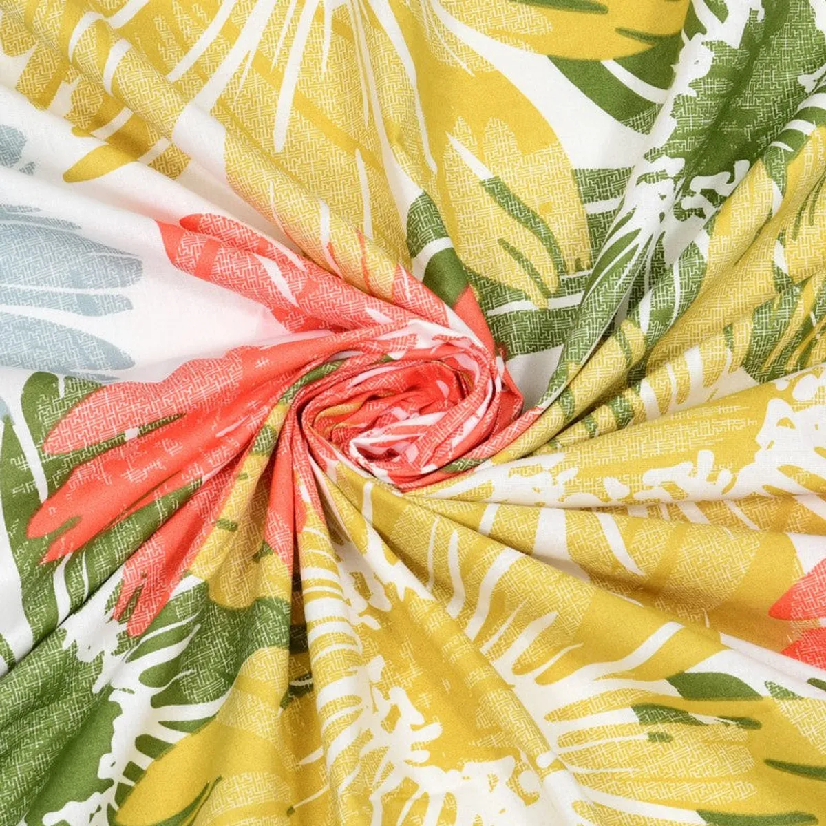 Close-up of colourful floral printed cotton fabric gathered in folds