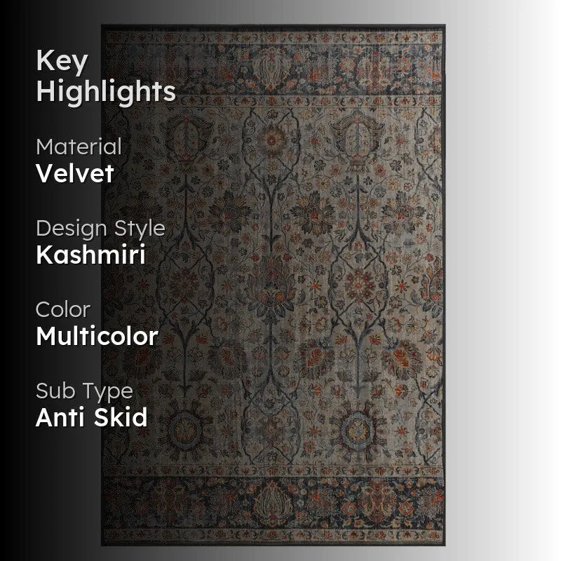 Rectangular multicolour carpet with Kashmiri-style motif on a dark background