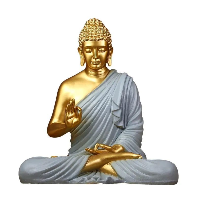 Isolated view of seated Buddha idol in grey and gold